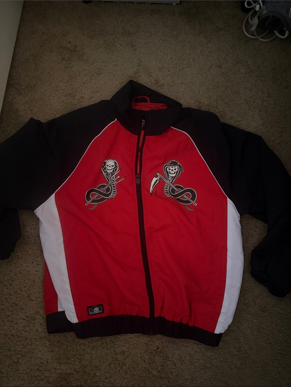 Red and Black Zip-Up Jacket with White Side Panels